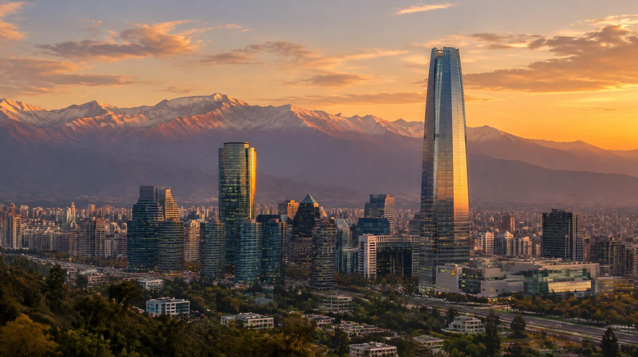 Santiago de Chile skyline with Andes mountains at dusk